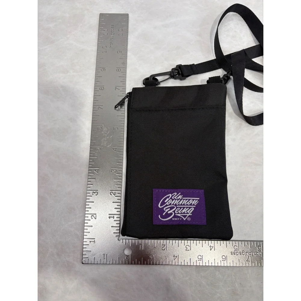 Uncommon Being Black Nylon Crossbody Neck Pouch‎ Utility Bag Purple Logo Patch